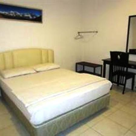 Mendu Inn Кучінг Номер фото